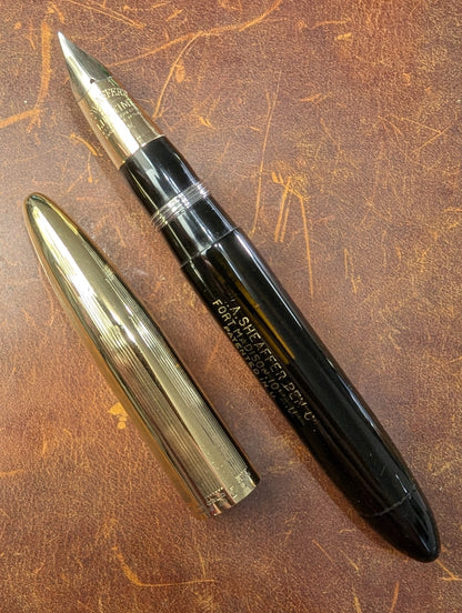 1942 Black Sheaffer Triumph Tuckaway Crest - medium+ point