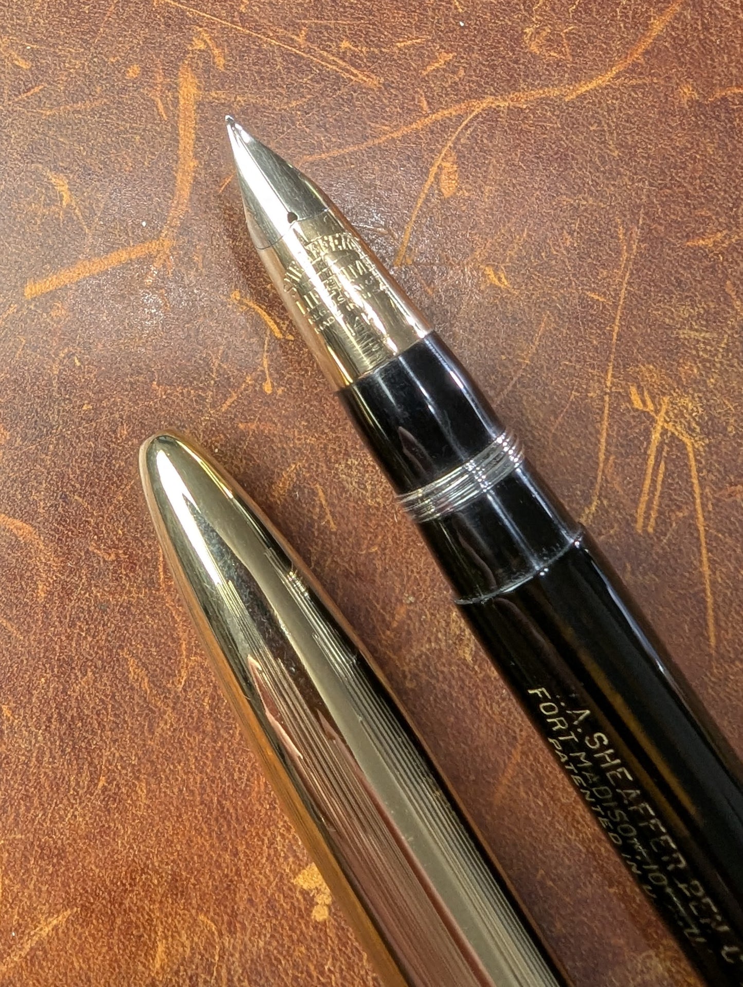 1942 Black Sheaffer Triumph Tuckaway Crest - medium+ point