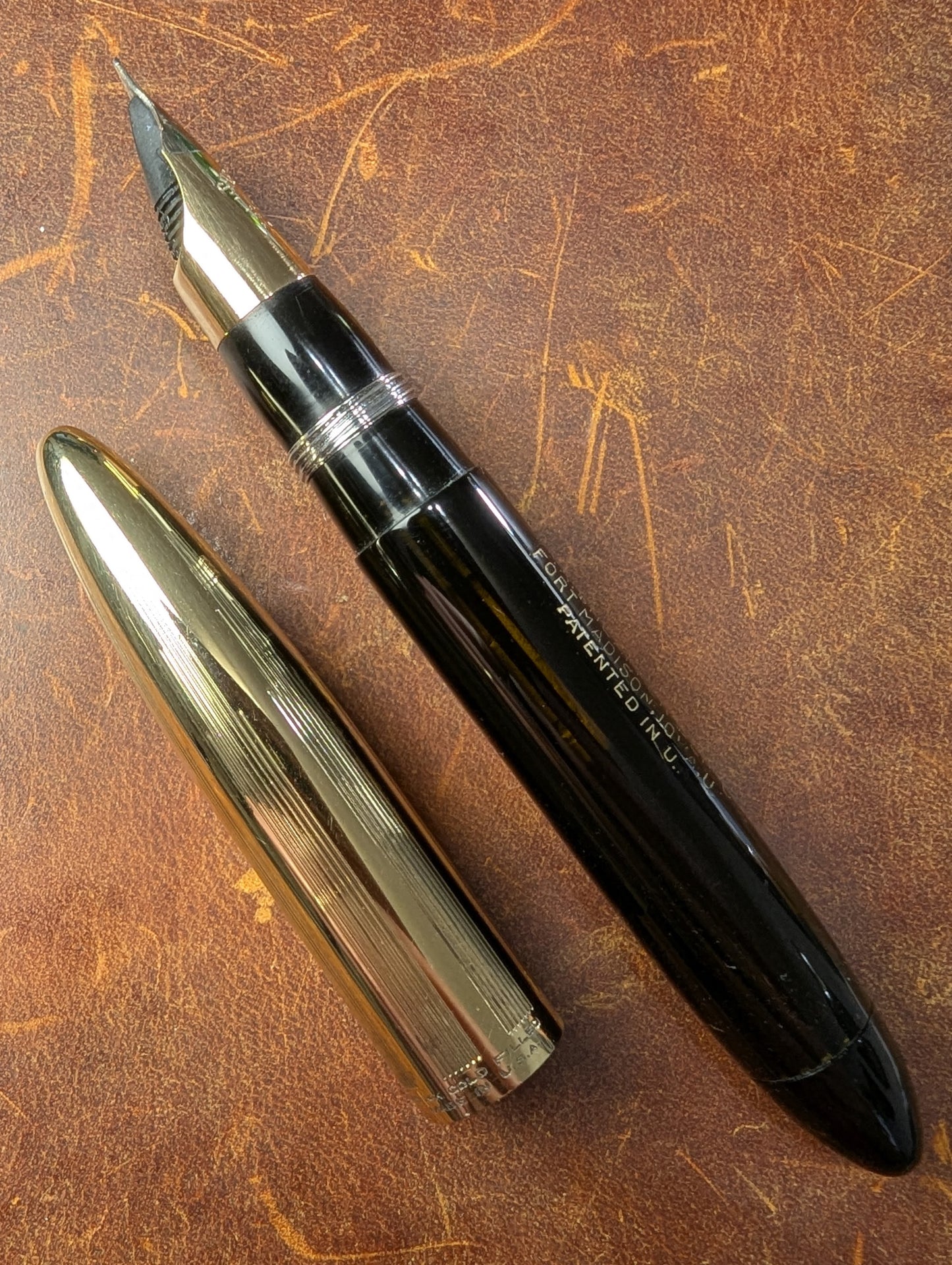 1942 Black Sheaffer Triumph Tuckaway Crest - medium+ point