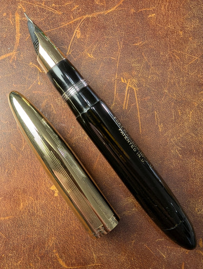 1942 Black Sheaffer Triumph Tuckaway Crest - medium+ point