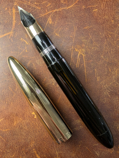 1942 Black Sheaffer Triumph Tuckaway Crest - medium+ point